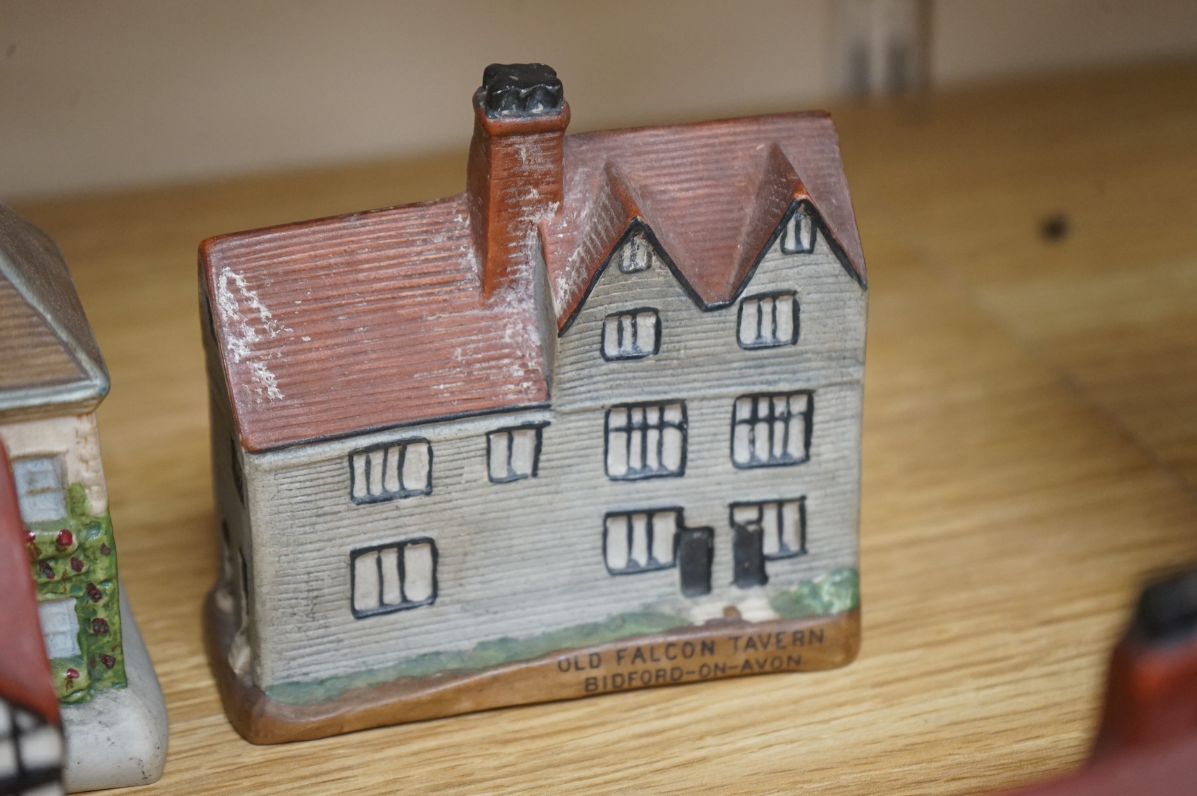 Five W.H Goss and Willow art pottery buildings, widest 14.5cm.